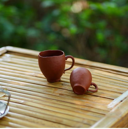 Purple clay tea cup